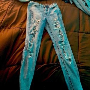Light wash skinny ripped jeans